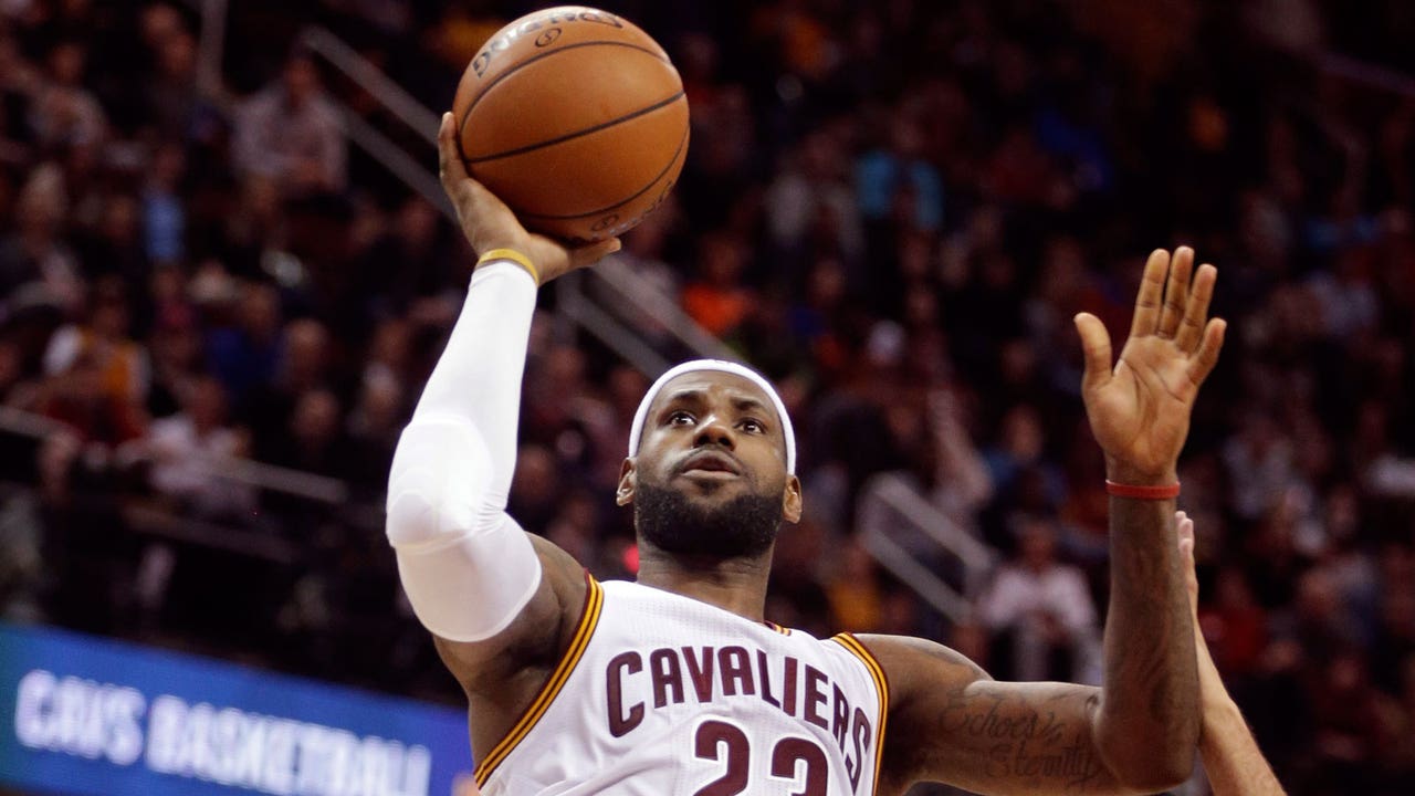 LeBron, Cavs show who's boss in stealing eighth straight win